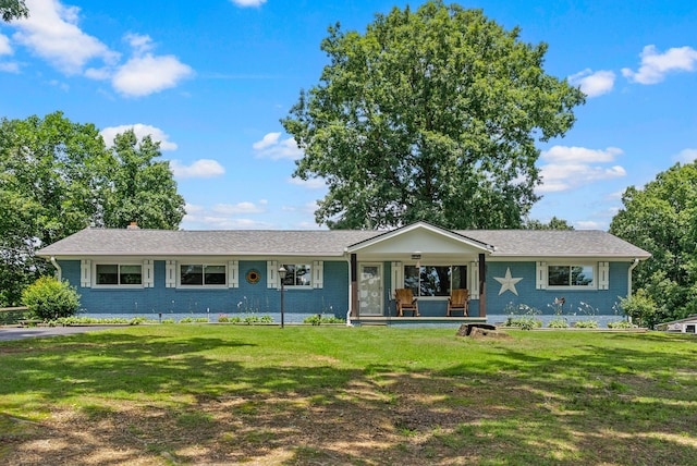 779 Dogwood Dr, Erin, TN 37061 - ranch-style house featuring a front lawn, covered porch, and brick siding