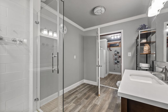 779 Dogwood Dr, Erin, TN 37061 - bathroom with a stall shower, wood finished floors, vanity, and ornamental molding
