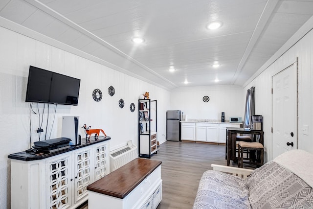 779 Dogwood Dr, Erin, TN 37061 - living area featuring wood finished floors, ornamental molding, and recessed lighting