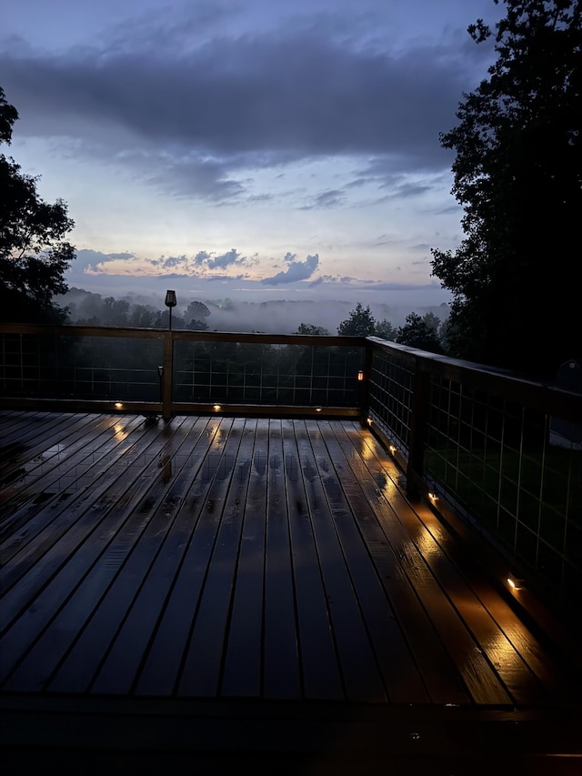 779 Dogwood Dr, Erin, TN 37061 - view of deck at dusk