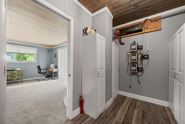 779 Dogwood Dr, Erin, TN 37061 - hall with wooden ceiling, a desk, and wood finished floors