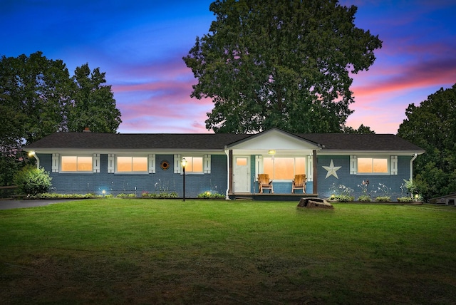 779 Dogwood Dr, Erin, TN 37061 - ranch-style home with a front lawn, brick siding, and covered porch