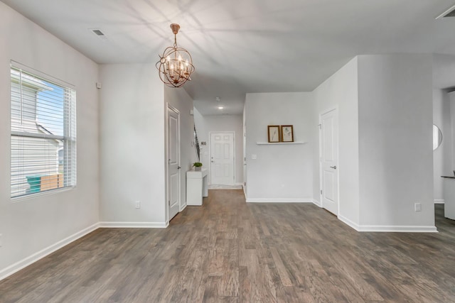 4112 Cadence Dr, Spring Hill, TN 37174 - empty room featuring a chandelier and dark wood-style floors