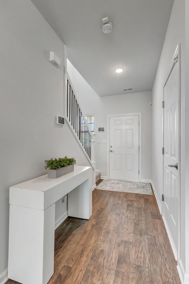 4112 Cadence Dr, Spring Hill, TN 37174 - foyer with dark wood-style flooring and stairway