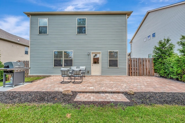 4112 Cadence Dr, Spring Hill, TN 37174 - rear view of house featuring a patio area