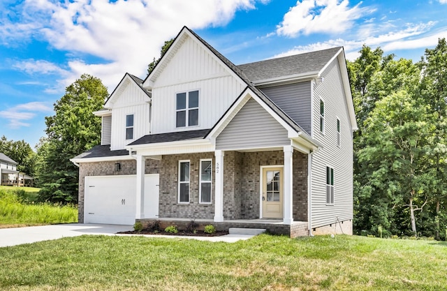 582 Pongracz Way, Clarksville, TN 37042 - view of front of house with driveway, a garage, a porch, a front yard, and board and batten siding