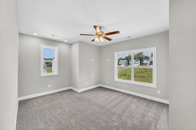 582 Pongracz Way, Clarksville, TN 37042 - unfurnished room with healthy amount of natural light, a ceiling fan, carpet flooring, and recessed lighting