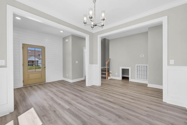 582 Pongracz Way, Clarksville, TN 37042 - unfurnished dining area with a chandelier, light wood finished floors, stairway, recessed lighting, and ornamental molding