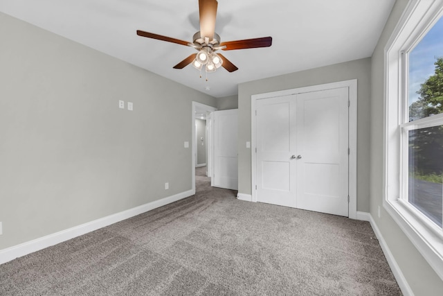 582 Pongracz Way, Clarksville, TN 37042 - unfurnished bedroom featuring carpet floors, multiple windows, and a closet