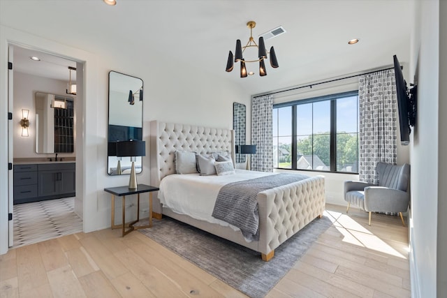 8227 Heirloom Blvd, College Grove, TN 37046 - bedroom featuring light wood-style flooring, a chandelier, recessed lighting, and ensuite bath