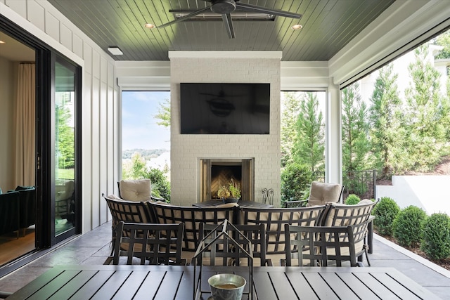 8227 Heirloom Blvd, College Grove, TN 37046 - wooden deck with a fireplace and ceiling fan