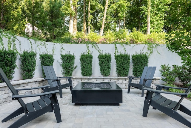 8227 Heirloom Blvd, College Grove, TN 37046 - fenced backyard with a fire pit and a patio area