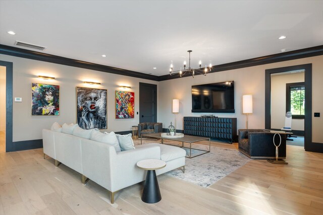 8227 Heirloom Blvd, College Grove, TN 37046 - living area featuring light wood-type flooring, crown molding, a chandelier, and recessed lighting
