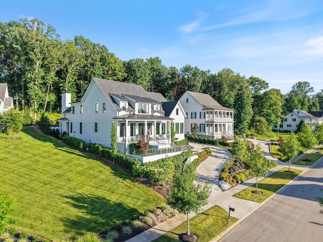 8227 Heirloom Blvd, College Grove, TN 37046 - view of front of property featuring a front lawn and a chimney