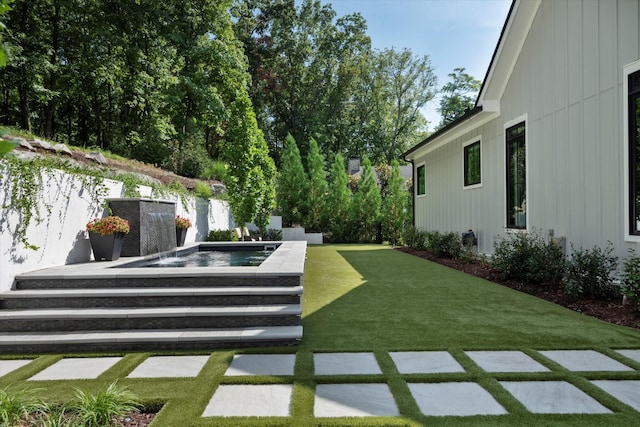 8227 Heirloom Blvd, College Grove, TN 37046 - view of green lawn featuring a jacuzzi