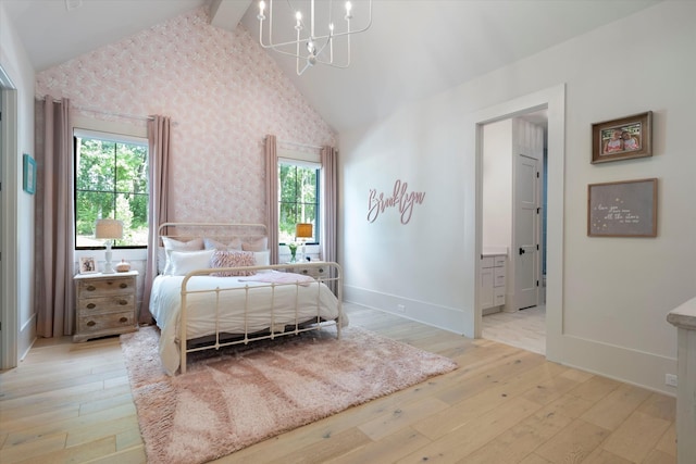 8227 Heirloom Blvd, College Grove, TN 37046 - bedroom featuring light wood-type flooring, multiple windows, a chandelier, wallpapered walls, and ensuite bath