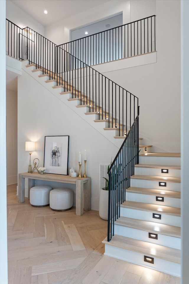 8227 Heirloom Blvd, College Grove, TN 37046 - stairway featuring a towering ceiling and recessed lighting