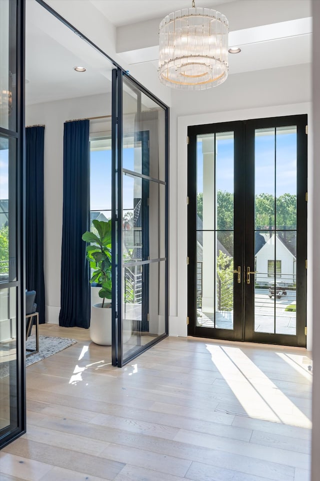 8227 Heirloom Blvd, College Grove, TN 37046 - doorway to outside with french doors, wood finished floors, a chandelier, and recessed lighting
