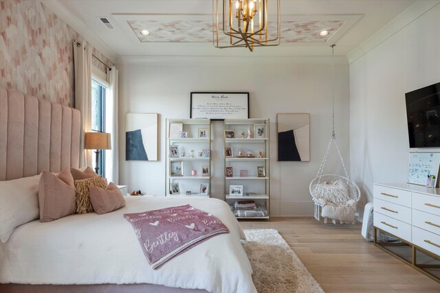 8227 Heirloom Blvd, College Grove, TN 37046 - bedroom featuring wood finished floors and a chandelier