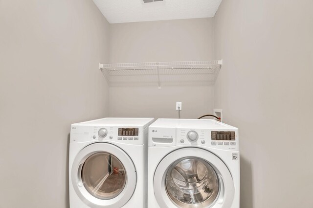 4835 Octavia St, Murfreesboro, TN 37129 - laundry area with washing machine and dryer