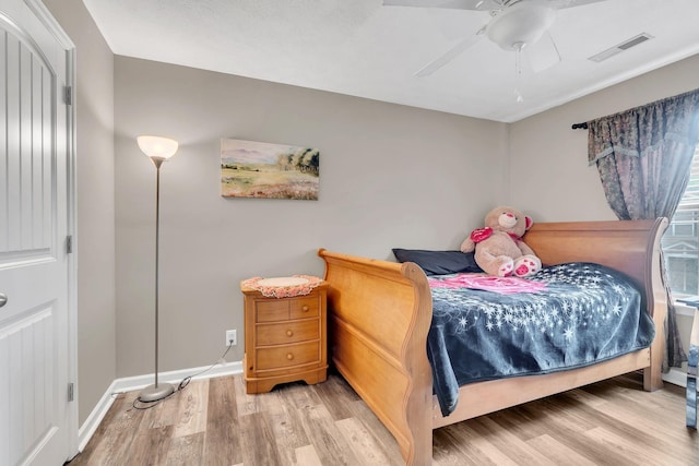 4835 Octavia St, Murfreesboro, TN 37129 - bedroom with wood finished floors and ceiling fan