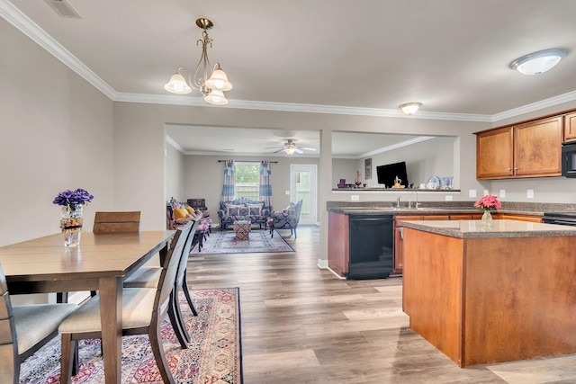 4835 Octavia St, Murfreesboro, TN 37129 - kitchen featuring black appliances, crown molding, light wood-type flooring, open floor plan, and brown cabinetry