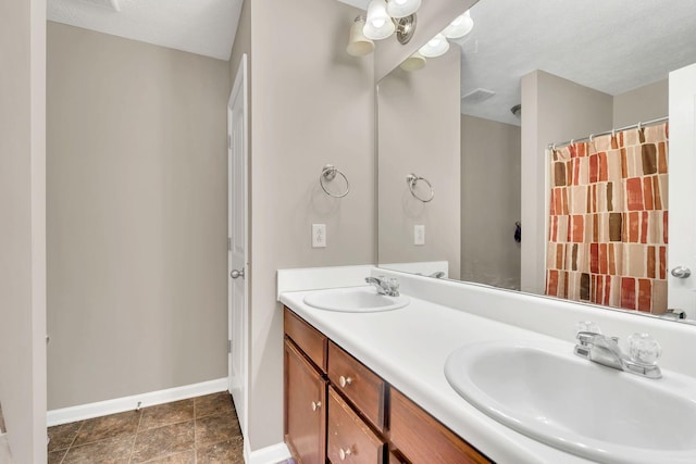 4835 Octavia St, Murfreesboro, TN 37129 - bathroom featuring double vanity and a textured ceiling