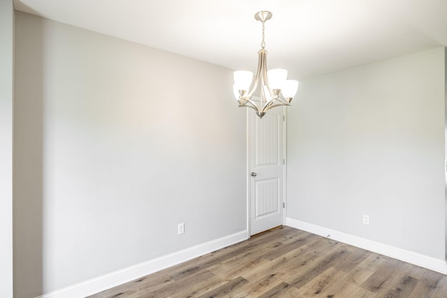 2075 Downstream Dr, Ashland City, TN 37015 - unfurnished room featuring a chandelier and light wood-style floors