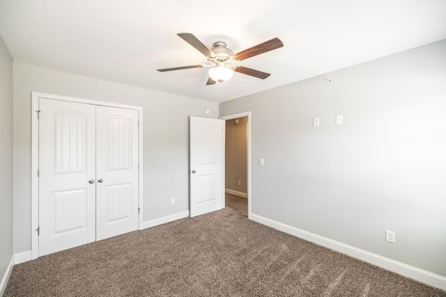 2075 Downstream Dr, Ashland City, TN 37015 - unfurnished bedroom featuring carpet, a closet, and a ceiling fan