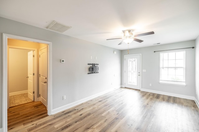 2075 Downstream Dr, Ashland City, TN 37015 - unfurnished room featuring a ceiling fan and light wood-style flooring
