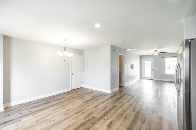 2075 Downstream Dr, Ashland City, TN 37015 - unfurnished living room with a chandelier, light wood-style floors, ceiling fan, and recessed lighting