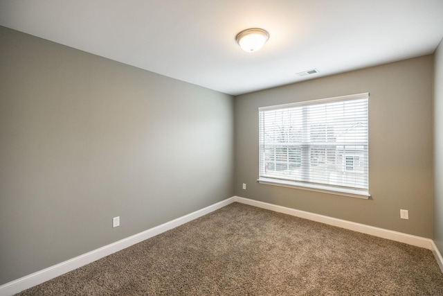 2071 Downstream Dr, Ashland City, TN 37015 - spare room with baseboards and carpet