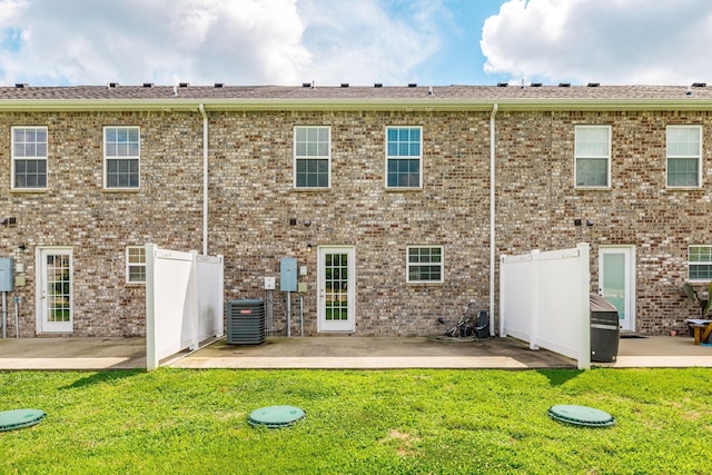 2071 Downstream Dr, Ashland City, TN 37015 - rear view of house with a patio area and brick siding
