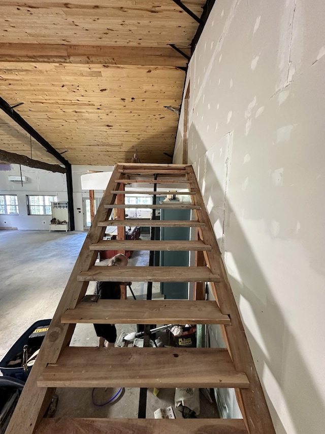 201 Summit Dr, Linden, TN 37096 - staircase featuring wooden ceiling and concrete floors