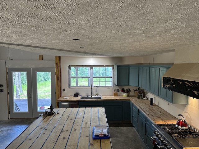 201 Summit Dr, Linden, TN 37096 - kitchen with a textured ceiling, range with gas cooktop, range hood, light countertops, and dishwasher