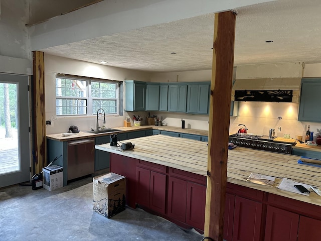 201 Summit Dr, Linden, TN 37096 - kitchen with dishwasher, a textured ceiling, gas cooktop, healthy amount of natural light, and butcher block counters
