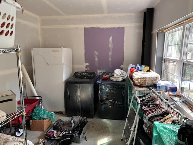201 Summit Dr, Linden, TN 37096 - miscellaneous room with washer / clothes dryer and concrete floors