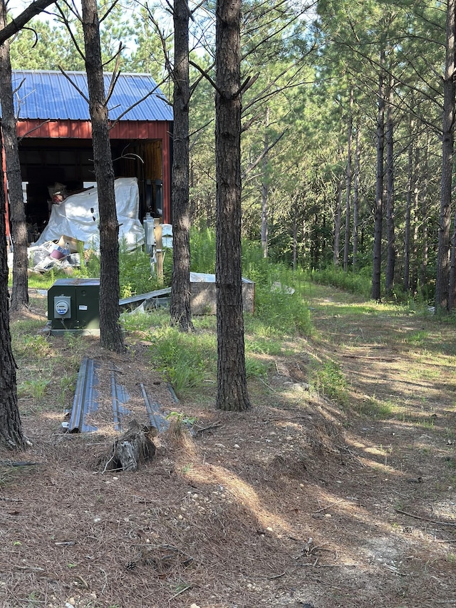 201 Summit Dr, Linden, TN 37096 - view of yard featuring an outbuilding and a wooded view