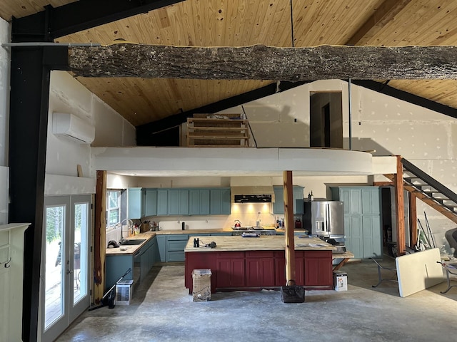 201 Summit Dr, Linden, TN 37096 - kitchen with stainless steel refrigerator with ice dispenser, concrete flooring, a wall unit AC, light countertops, and a wooden ceiling with exposed beams