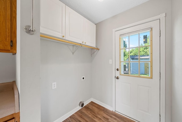 1066 Shadow Ridge Ave, Oak Grove, KY 42262 - laundry room featuring hookup for an electric dryer, cabinet space, and wood finished floors
