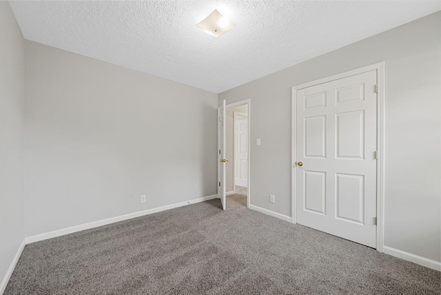 1066 Shadow Ridge Ave, Oak Grove, KY 42262 - unfurnished bedroom with carpet floors and a textured ceiling
