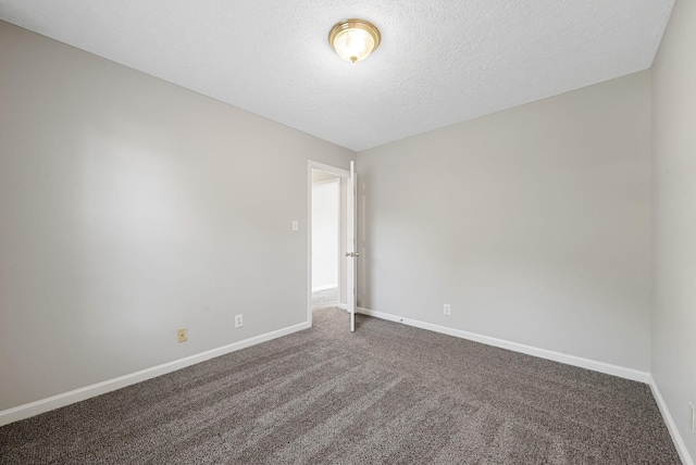1066 Shadow Ridge Ave, Oak Grove, KY 42262 - carpeted spare room featuring baseboards and a textured ceiling