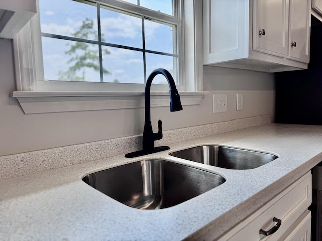 1122 Brannon Rd, Lawrenceburg, TN 38464 - kitchen view of a sink and white cabinets