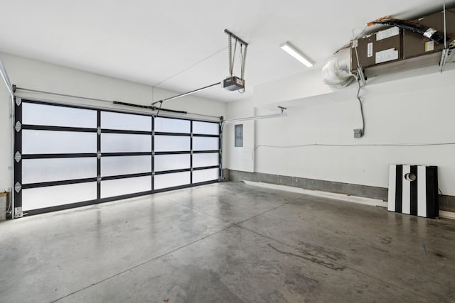 1111 Baptist World Center Dr Unit 5, Nashville, TN 37207 - garage featuring a garage door opener and electric panel