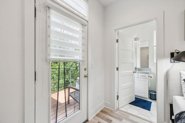 1111 Baptist World Center Dr Unit 5, Nashville, TN 37207 - doorway to outside featuring light wood-style floors and baseboards