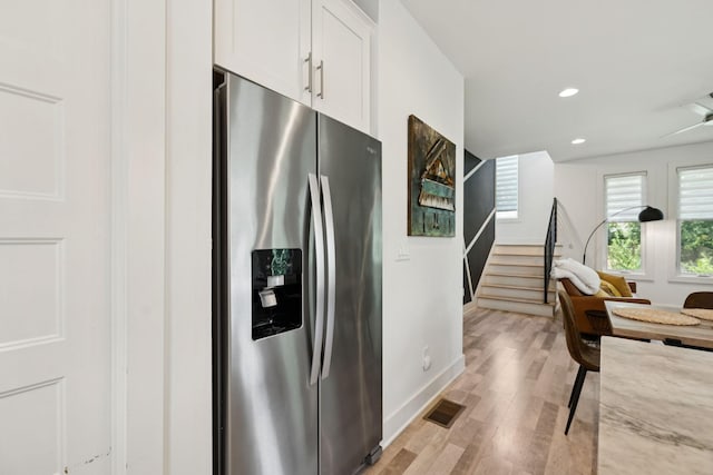 1111 Baptist World Center Dr Unit 5, Nashville, TN 37207 - kitchen featuring stainless steel fridge with ice dispenser, white cabinets, light wood-style flooring, and recessed lighting