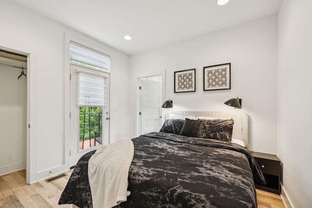 1111 Baptist World Center Dr Unit 5, Nashville, TN 37207 - bedroom with light wood-style floors, recessed lighting, and access to exterior