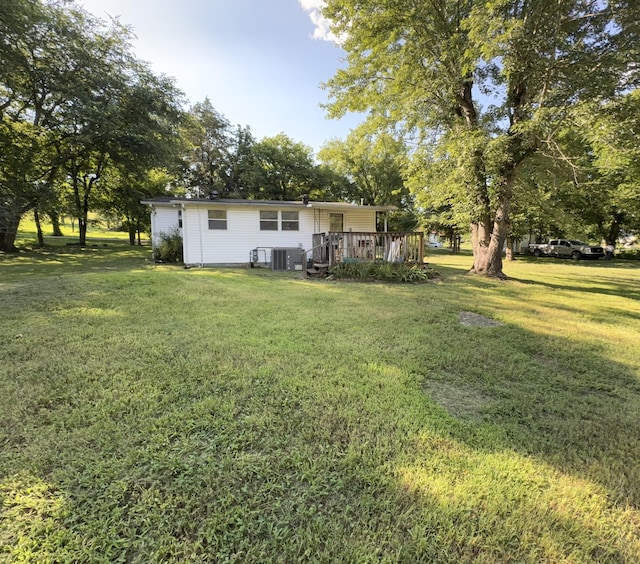 11 Beasley Bend Rd, Riddleton, TN 37151 - rear view of property with a lawn and a deck