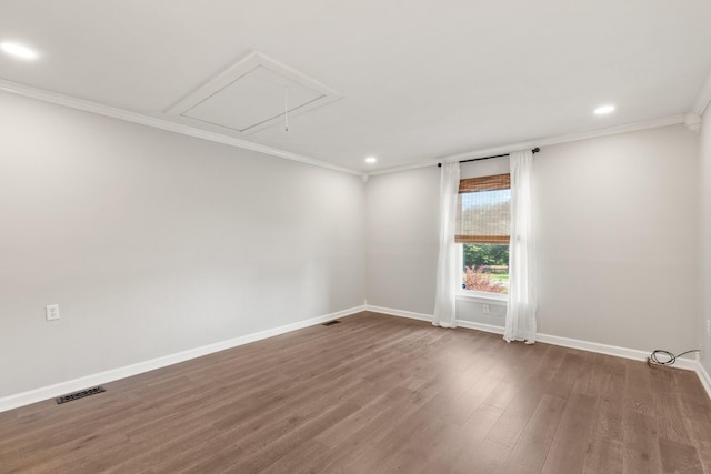 8205 Brownstone Ext, Cross Plains, TN 37049 - spare room with attic access, recessed lighting, dark wood-type flooring, and ornamental molding