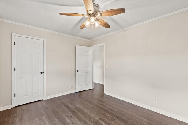 8205 Brownstone Ext, Cross Plains, TN 37049 - unfurnished bedroom featuring dark wood-style floors, crown molding, and a ceiling fan